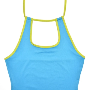 Detail of blue rib-knit crop top featuring vibrant yellow-green contrast binding edges