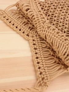 Handmade woven mesh shoulder bag with tassels in light brown bohemian beach style