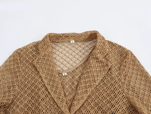 Detail view of the brown mesh texture and neckline label showing size S on the top