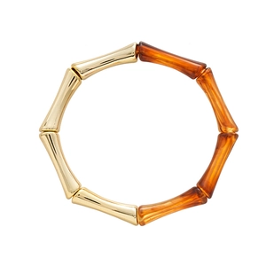 Bracelet jonc géométrique en acrylique ambre et métal doré avec design de bambou chic