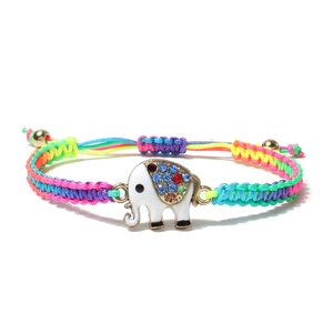 Handmade woven colorful string bracelet featuring a crystal-studded elephant charm
