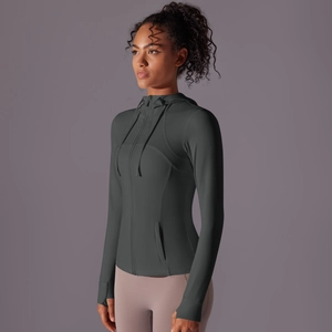 Detail of slim fit athletic jacket featuring thumbhole cuffs and a full zipper closure