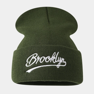 Dark green Brooklyn embroidered knit beanie with cuffed design for winter warmth