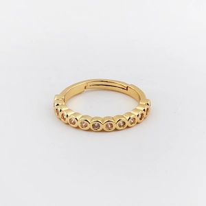 Minimalist gold plated adjustable knuckle ring featuring nine sparkling cubic zirconia stones