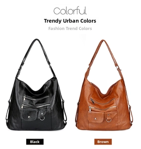 Parallel view of black and brown leather crossbody bags with multi-zipper pockets