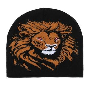 Black knitted beanie hat featuring a vibrant lion head pattern for a trendy street look