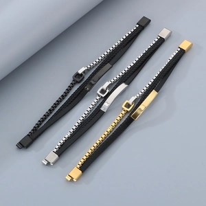 Detail of multi-layer braided leather bracelets with stainless steel magnetic clasps