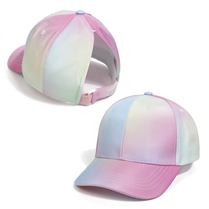 Detail view of gradient ponytail baseball cap with adjustable strap and large opening