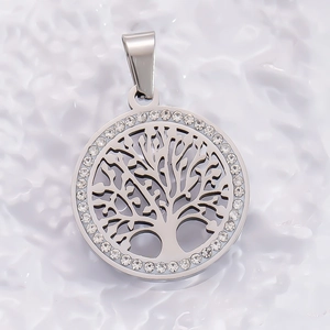 Detailed macro view of the silver tree of life pendant featuring sparkling crystal stones