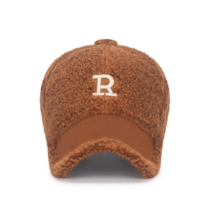 Brown teddy fleece baseball cap with white R embroidery on a clean white background