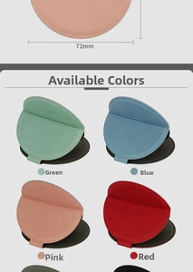 Detail view of 72mm round leather folding makeup mirrors in green, blue, pink, and red