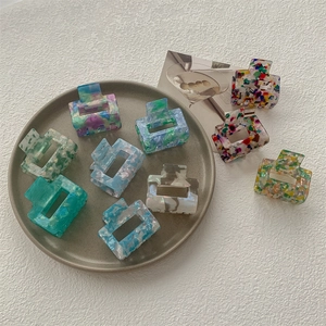 Set di mollette per capelli rettangolari in acetato con motivi marmorizzati e colori