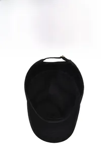 Detail of black military flat top cap showing adjustable metal buckle and breathable interior