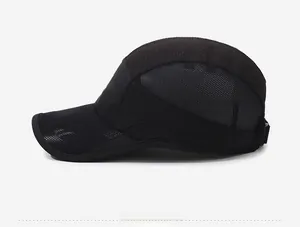 Detail view of black breathable mesh side panel and adjustable strap on outdoor sports cap