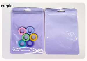Detail of purple resealable packaging bag with hanging hole and clear window for jewelry