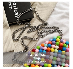 Close-up of vibrant candy-colored beaded bag featuring a chunky silver metal chain strap