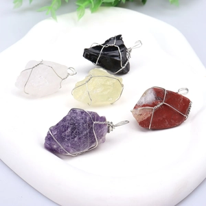 Set of five handmade natural crystal wire wrapped pendants in various vibrant colors