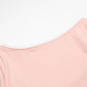 Detailed close-up of pink square neck top showing white lace trim and fine stitching