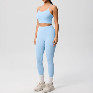 Light blue yoga set featuring a thin strap sports bra and high waisted leggings