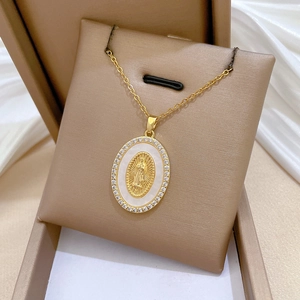 Gold titanium necklace with shell Virgin Mary pendant and sparkling crystal halo