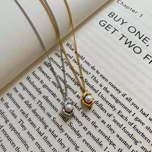 Minimalist stainless steel necklaces with irregular pearl pendants in gold and silver