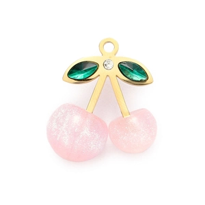 Close-up of pink glitter cherry pendant with gold frame and leaf rhinestone detail