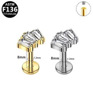 Detail view of G23 titanium labret studs with internal thread and square cubic zirconia
