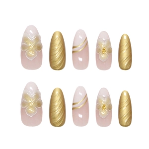 Handmade press-on nails with 3D gold foil floral design and pink shimmer long oval shape