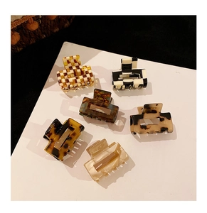 Detailed set of 6 checkered and marble acetate square hair claws for women's hairstyles
