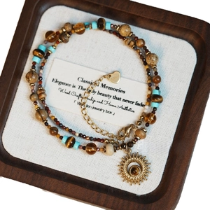 Bracelet multicouche vintage avec pendentif soleil et pierres en boîte en bois