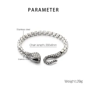 Close-up of stainless steel snake head clasp with scale texture and chunky box chain link