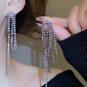 Elegant lavender sparkling rhinestone tassel earrings with a multi-layered geometric drop design