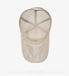 Internal view showing breathable mesh structure and reinforced stitching of the beige cap