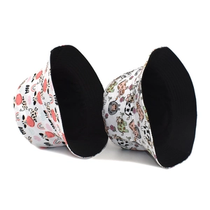 Cotton bucket hat with cartoon cow MOO print and black lining for summer outdoor wear
