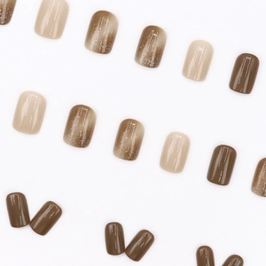 Short square round glitter nails in beige and coffee brown cat eye magnet shimmer finish