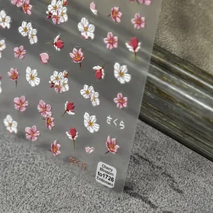 3D embossed cherry blossom nail art stickers with white and pink Sakura petal designs