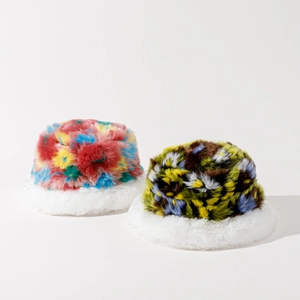 Close-up of thick multi-color faux fur textures on plush bucket hats for winter warmth