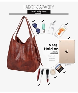 Brown vintage faux leather tote bag showing large capacity for iPad and daily essentials