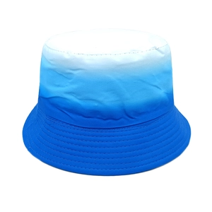 Close-up of blue and white gradient canvas sun hat with reinforced stitching on the brim