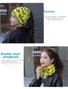 Detail of yellow knit neck warmer with black lettering showing dual-layer thermal structure