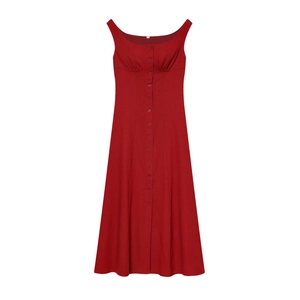 Detailed close-up of a red sleeveless linen-blend dress featuring a sweetheart neckline