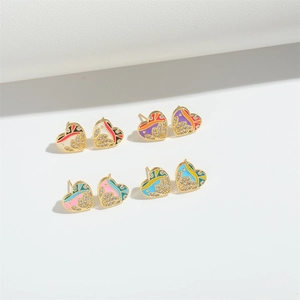 Minimalist gold heart earrings set with colorful enamel and diamond accents
