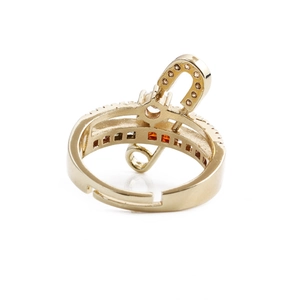Adjustable gold musical note ring with colorful zircon stones on white background