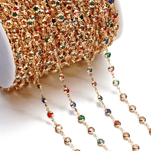 Detail of star-shaped colorful crystal chain on a spool for DIY jewelry making