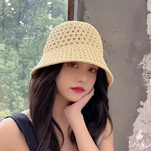 Detail showing hand-woven hollow-out texture of a breathable beige crochet bucket hat