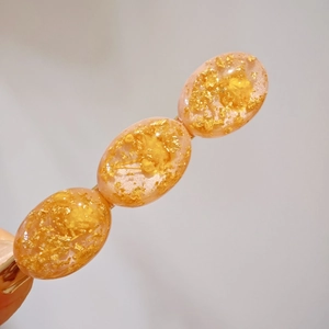 Exquisite 8cm amber hair clip with gold foil flakes and three oval floral components