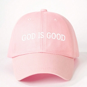 Detail of light pink cotton baseball cap featuring white GOD IS GOOD embroidery