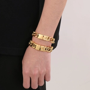 Close-up of double layered gold plated titanium steel cuban link bracelets for men