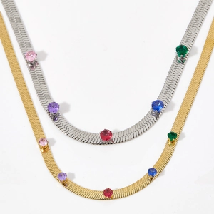 Collane a serpente in oro e argento con intarsi di pietre preziose in zirconi colorati