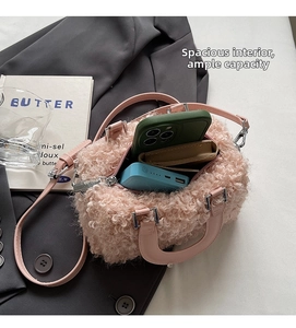 Detail view of pink plush Boston bag showing spacious interior for daily essentials